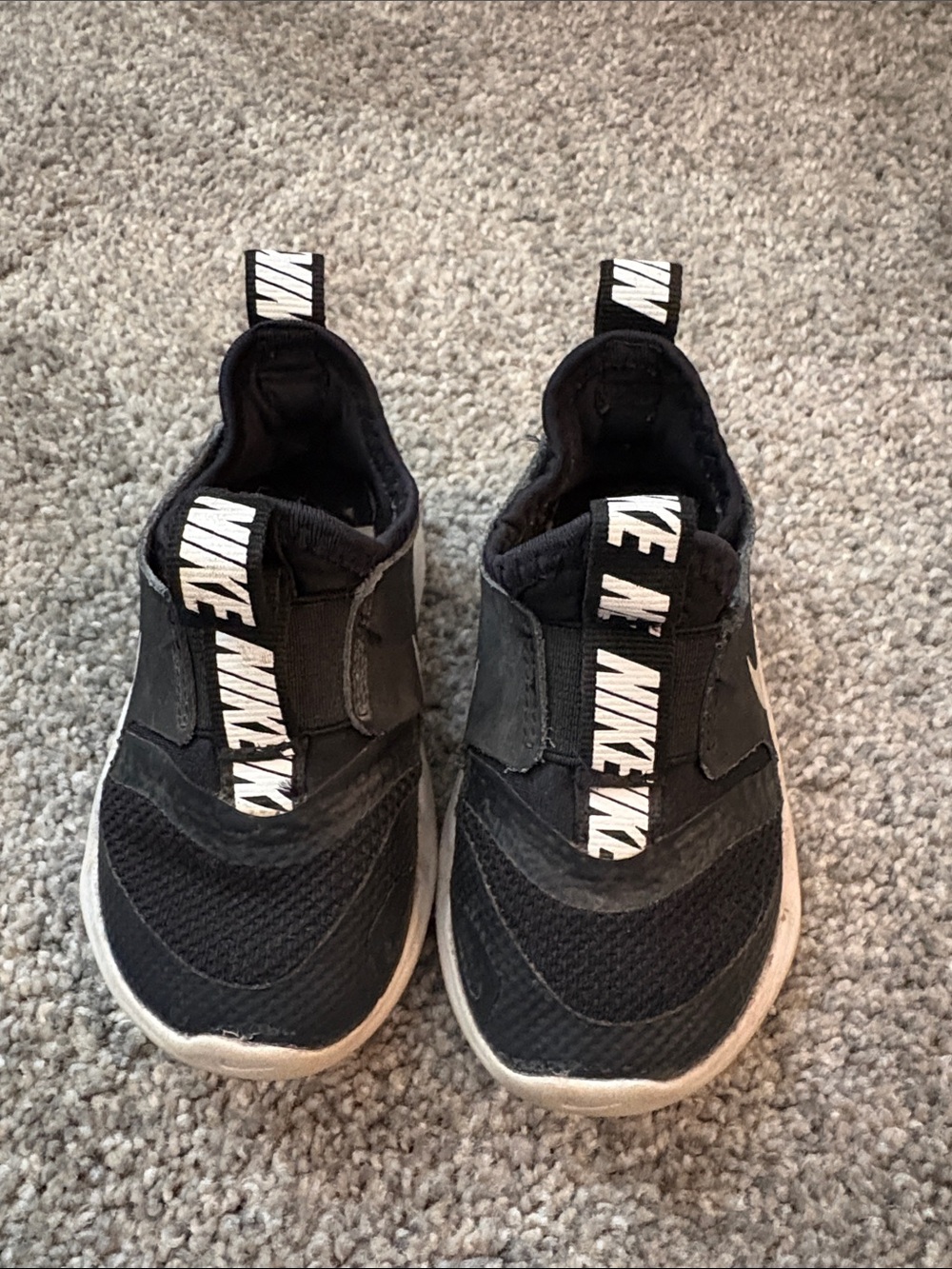 Nike Kids Black Slip-On Sneakers with White Branding